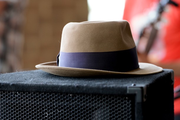 A hat sits on top of a speaker as Jon Ponder plays the AnnArbor.com Summer Concert Series on Friday afternoon. Melanie Maxwell I AnnArbor.com